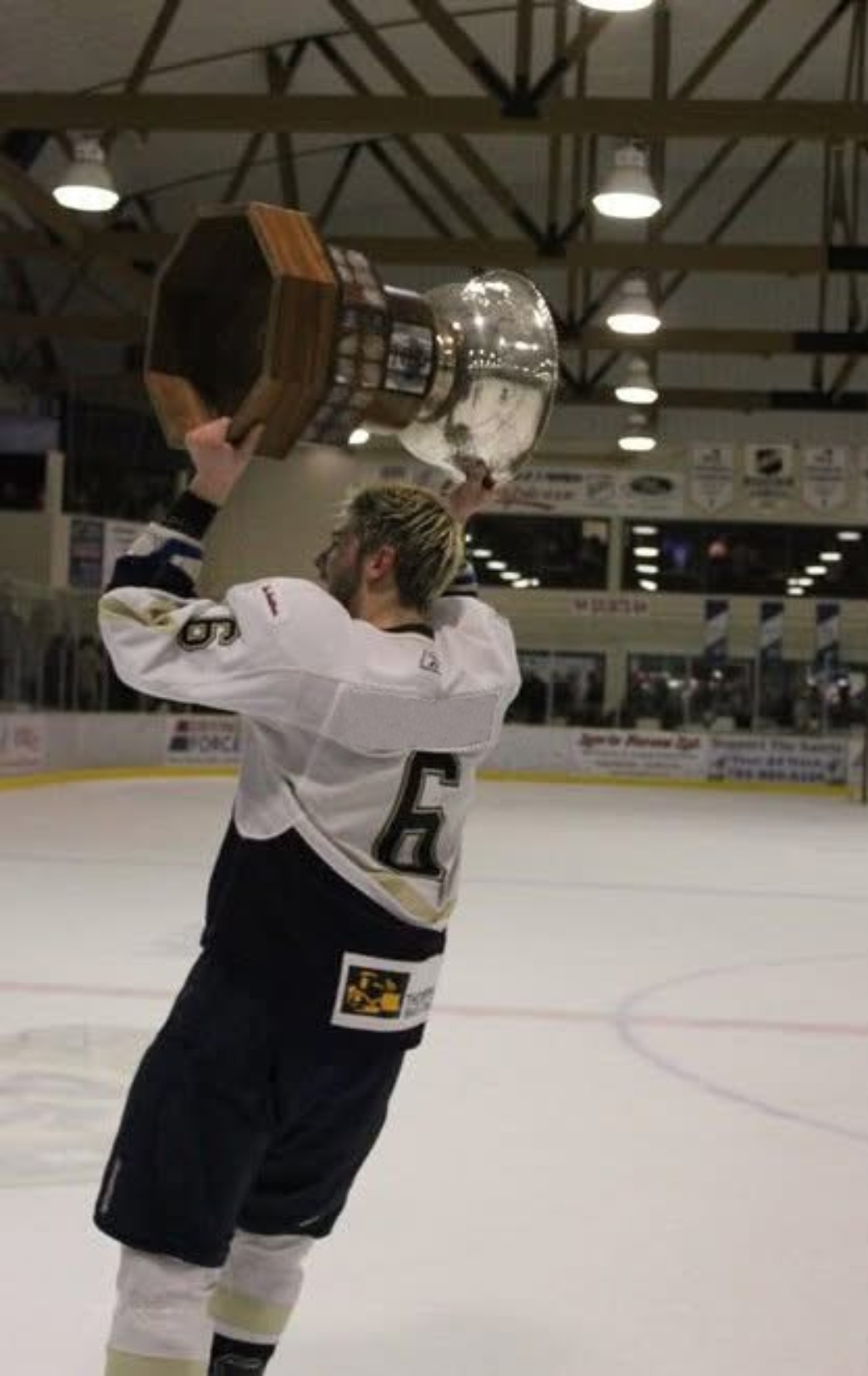 Summit Sports 60 Player skillfully dribbles past defenders on glossy turf